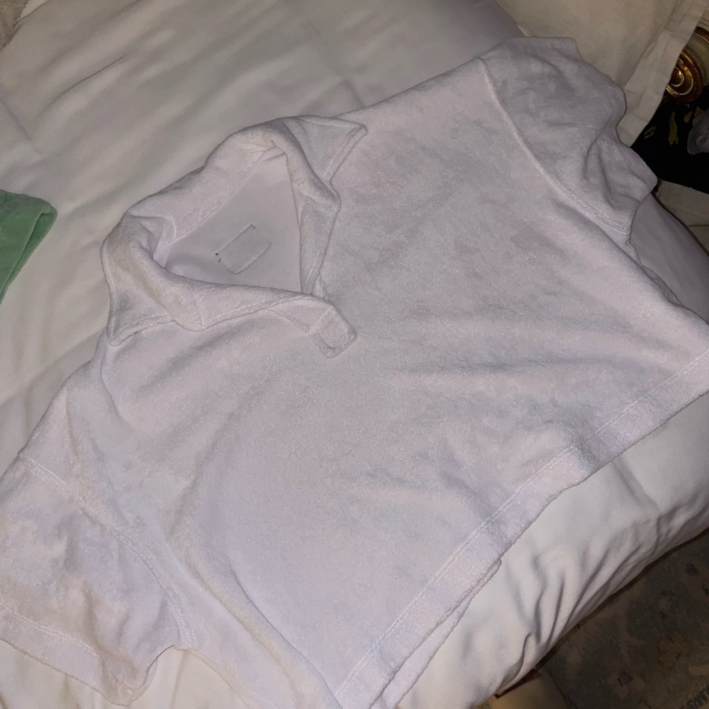 Daily Drills towel Terry cropped collared shirt with DD logo on the back